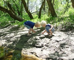 children playing mud protect with alpha lipid lifeline colostrum