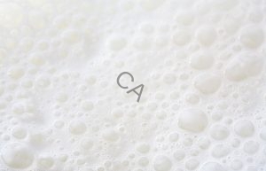 Alpha lipid lifeline colostrum mixed forming milk bubbles